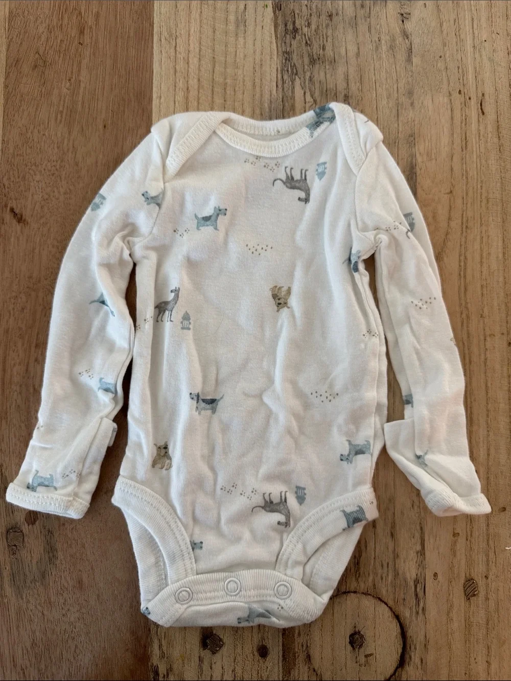 Carter's Cream Long-Sleeve Bodysuit with Blue and Tan Animal Prints